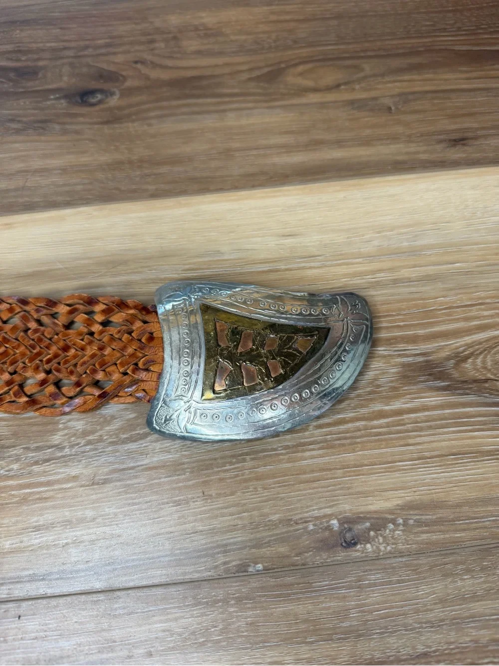 Handwoven Brown Leather Belt with Decorative Silver Buckle